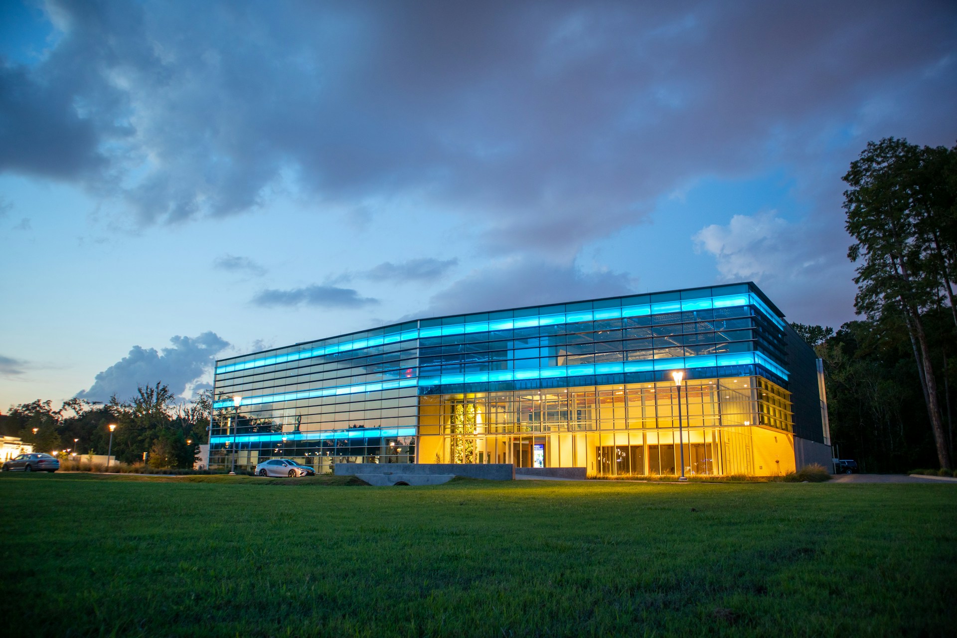 white and blue building under cloudy sky during daytime