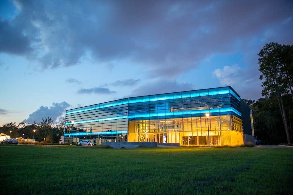 white and blue building under cloudy sky during daytime