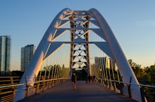 people walking on white bridge during daytime