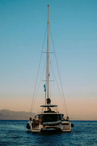 black and white boat on sea during daytime