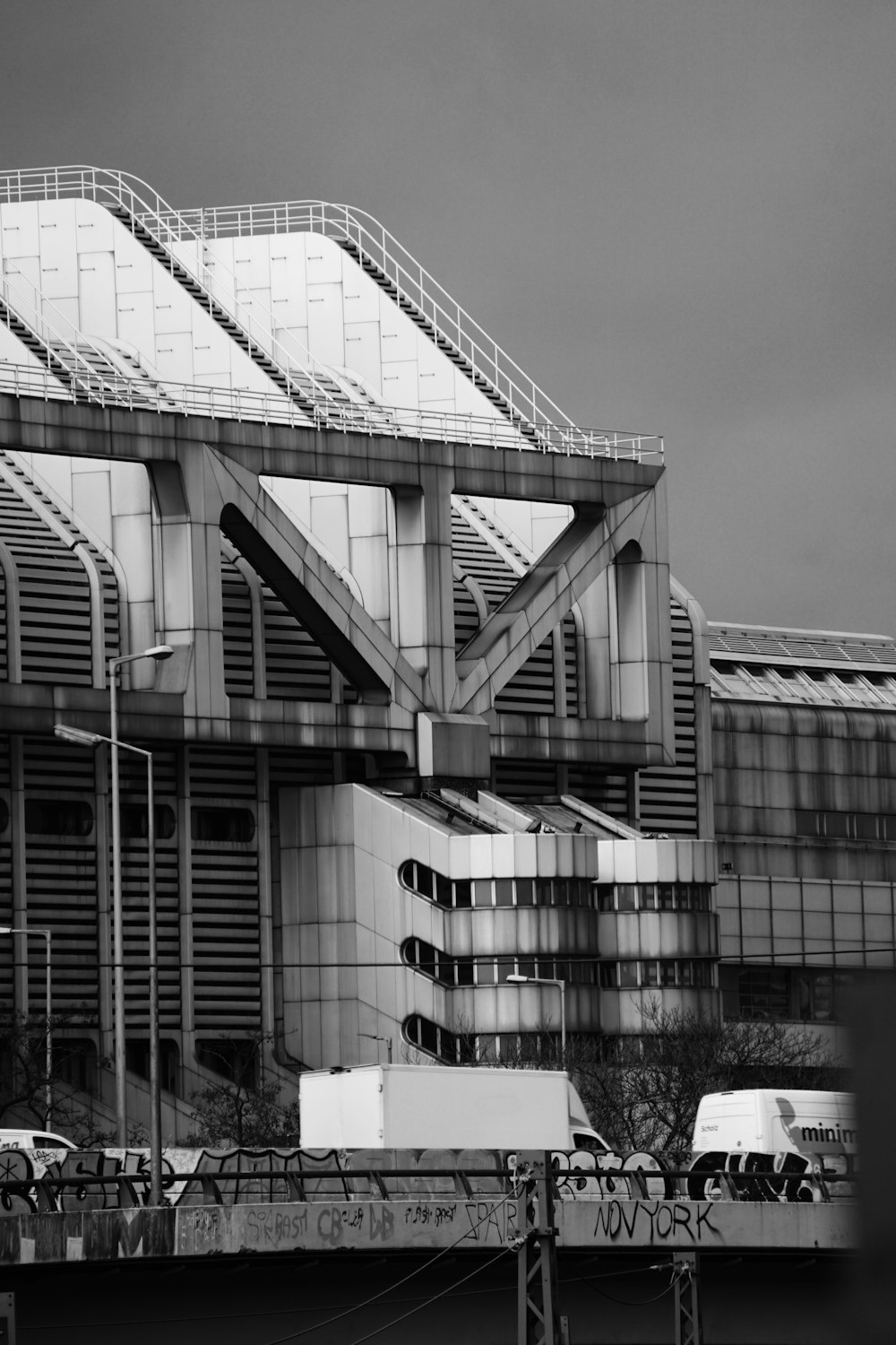 grayscale photo of building with stairs