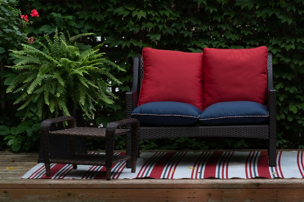 red and white striped padded brown wooden armchair