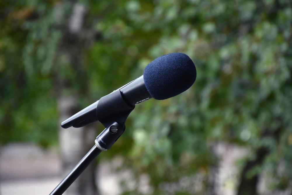 black microphone on black microphone stand