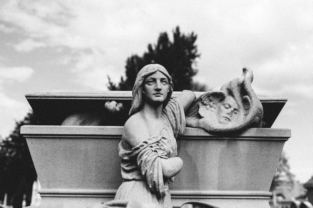 grayscale photo of angel statue