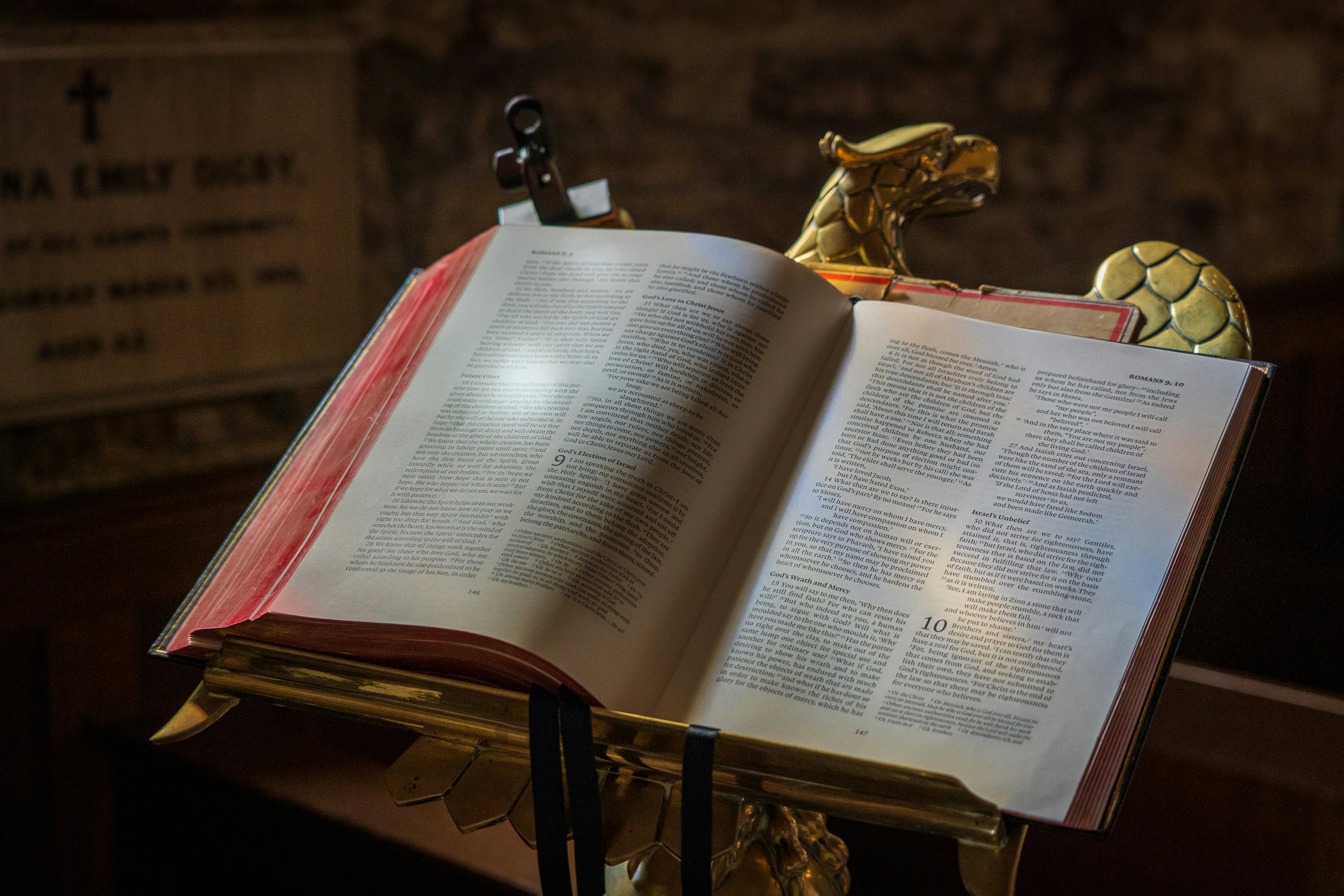 white book page on brown wooden table