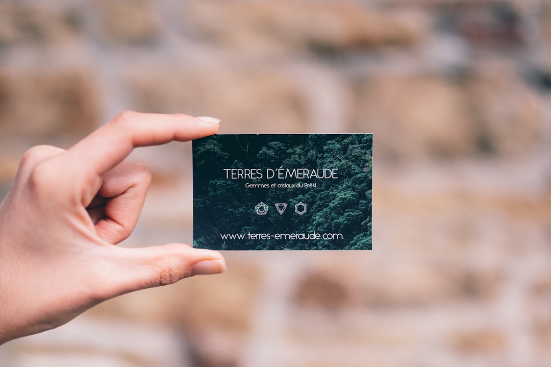 person holding black and white card,