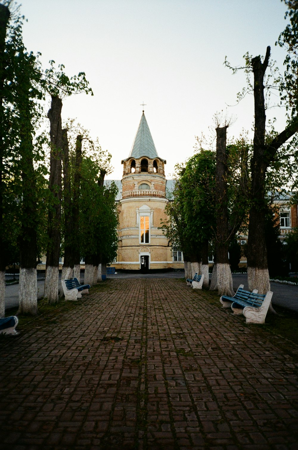 a large building with a tower and a clock on it