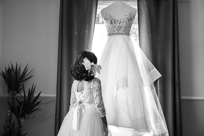 grayscale photo of woman in wedding dress
