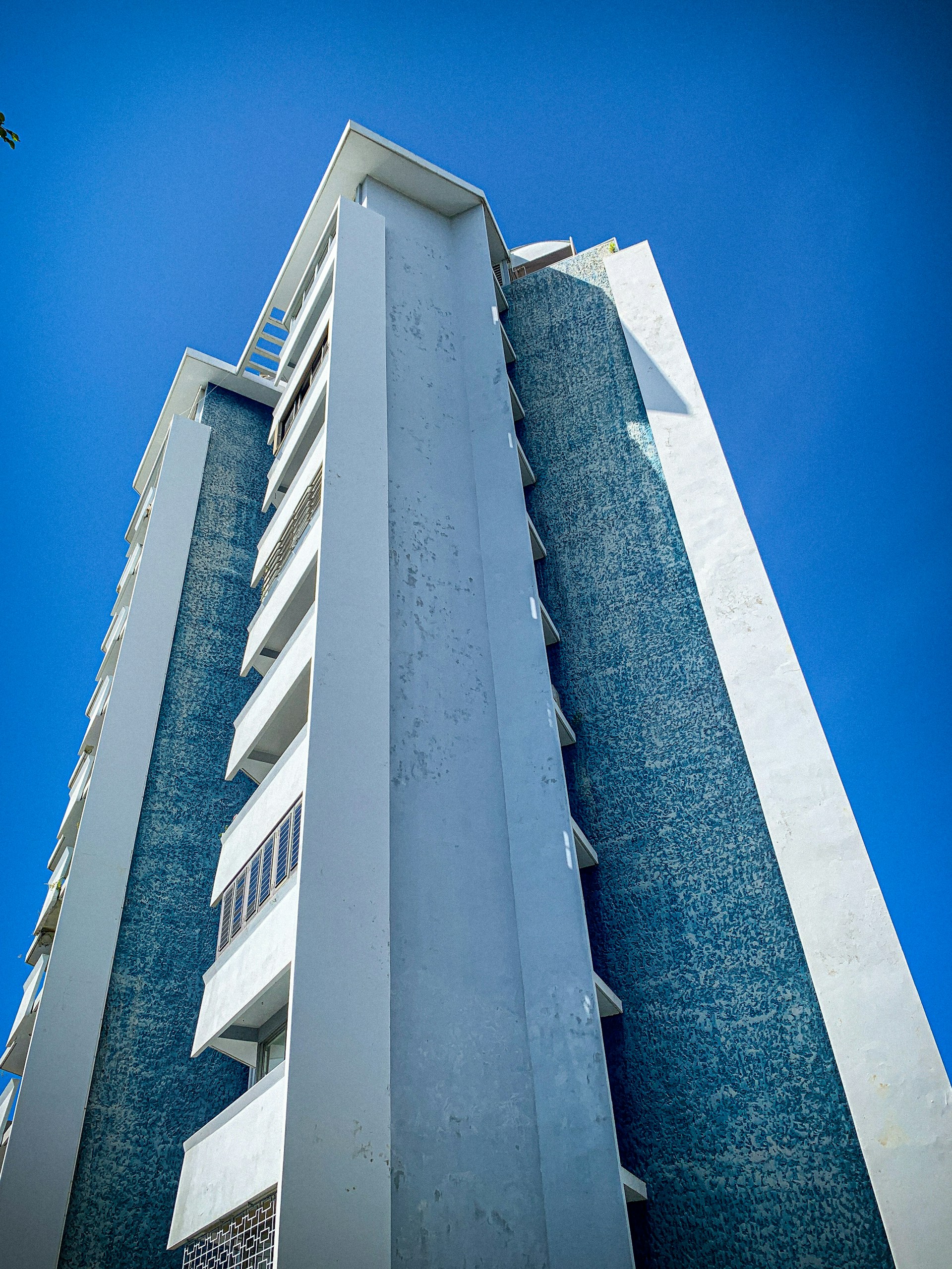 black and brown leather padded tub sofa