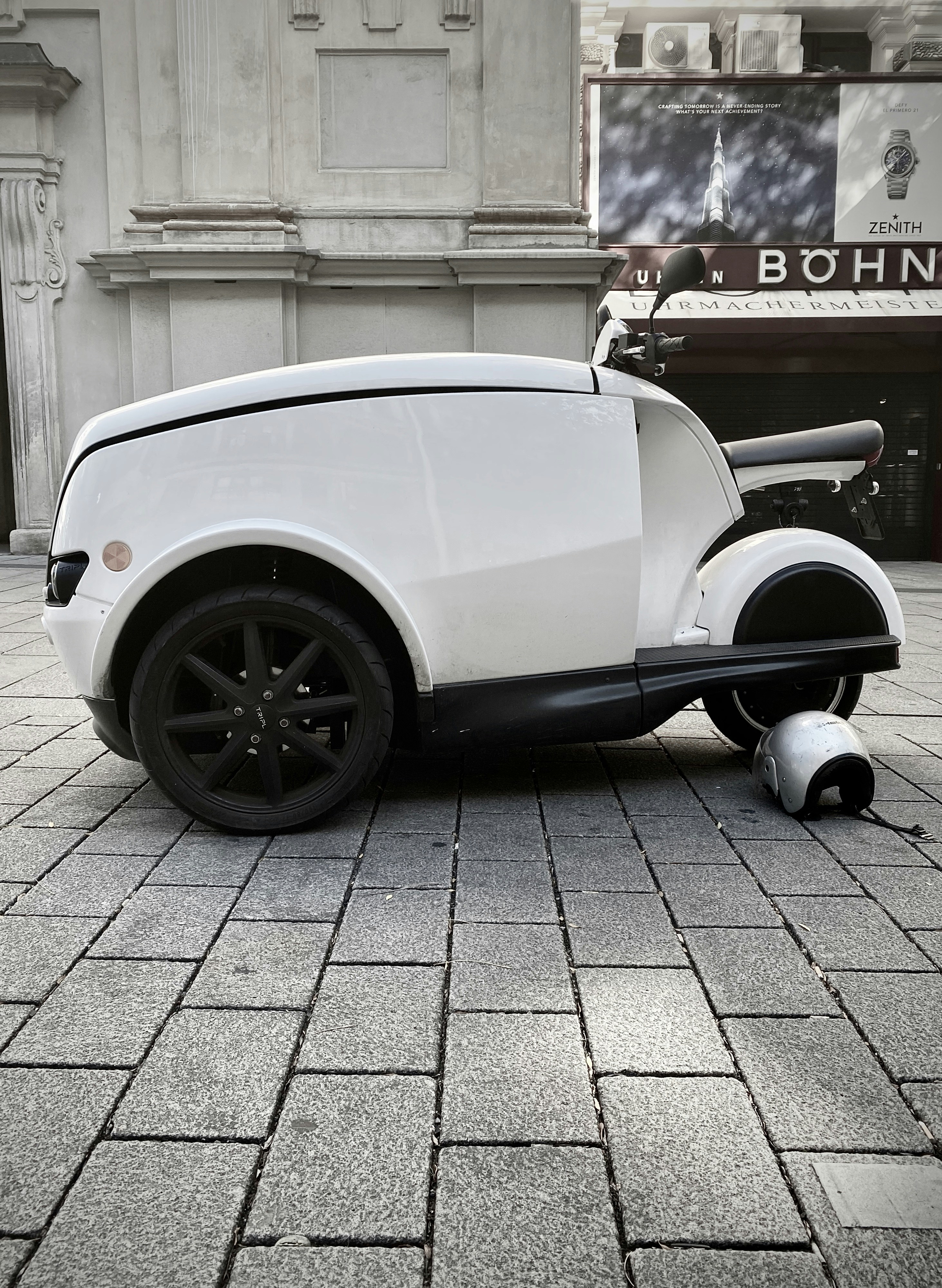 black and brown leather padded tub sofa