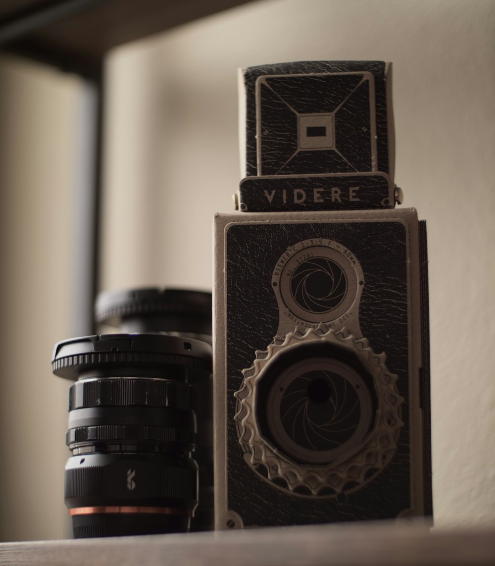 black and silver camera in close up photography