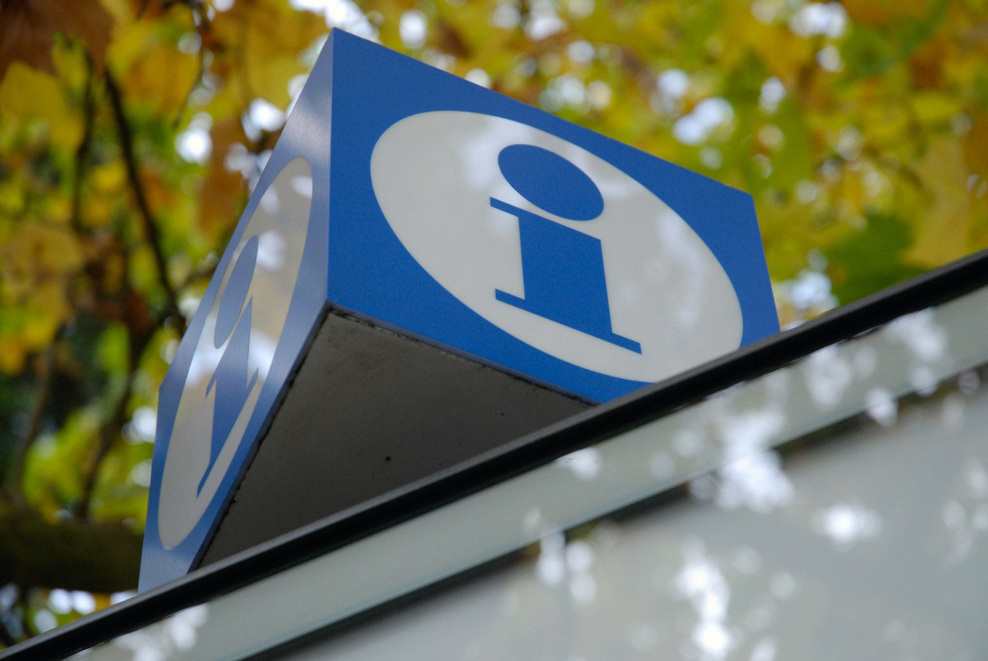 Blue and white information sign