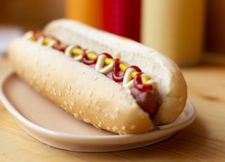 hotdog sandwich on white plate