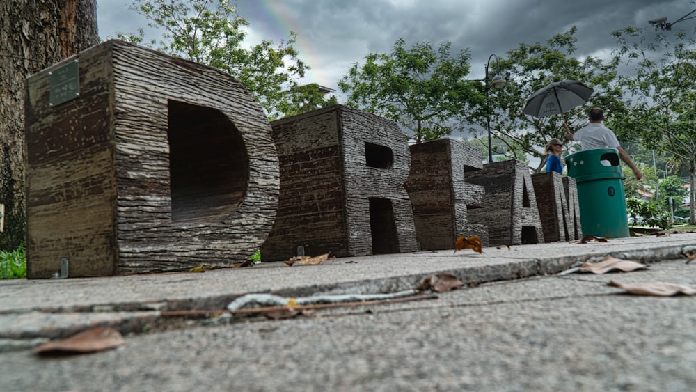 brown brick building near green trees during daytime