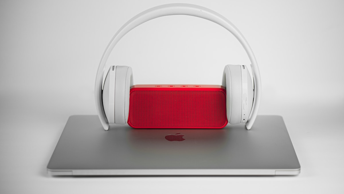 Red and white beats by dr dre headphones