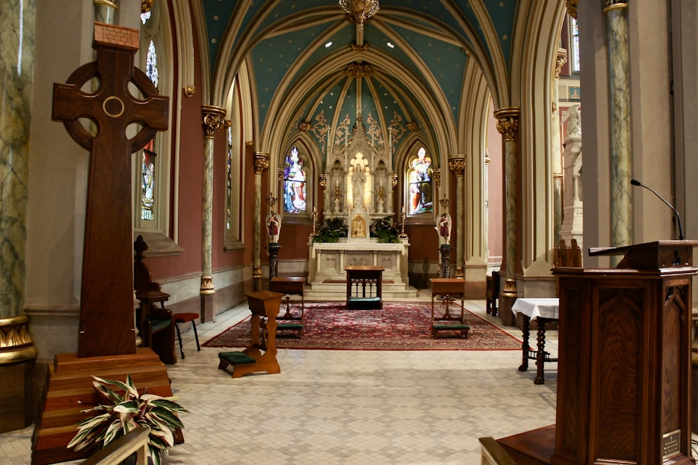 brown wooden bench inside cathedral