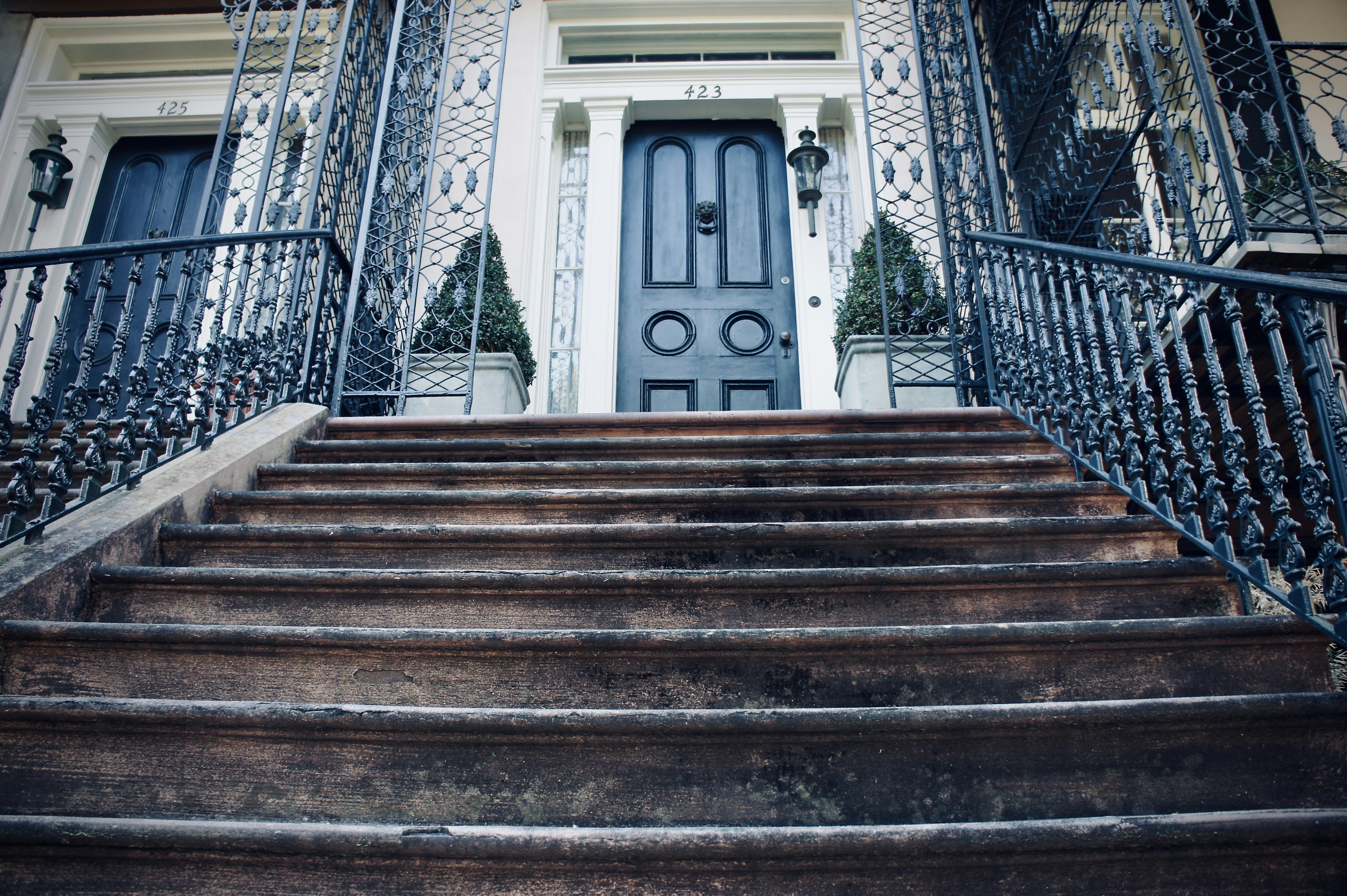 brown and white concrete staircase, Front of a beautiful historic home in Savannah, Georgia