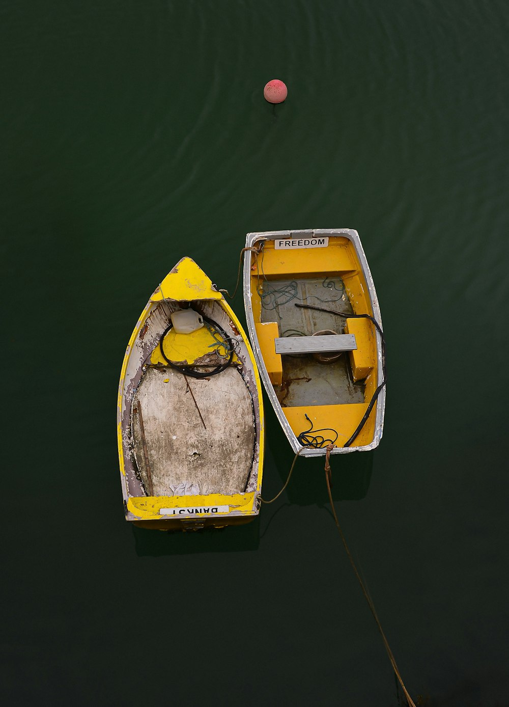 yellow and white boat on water
