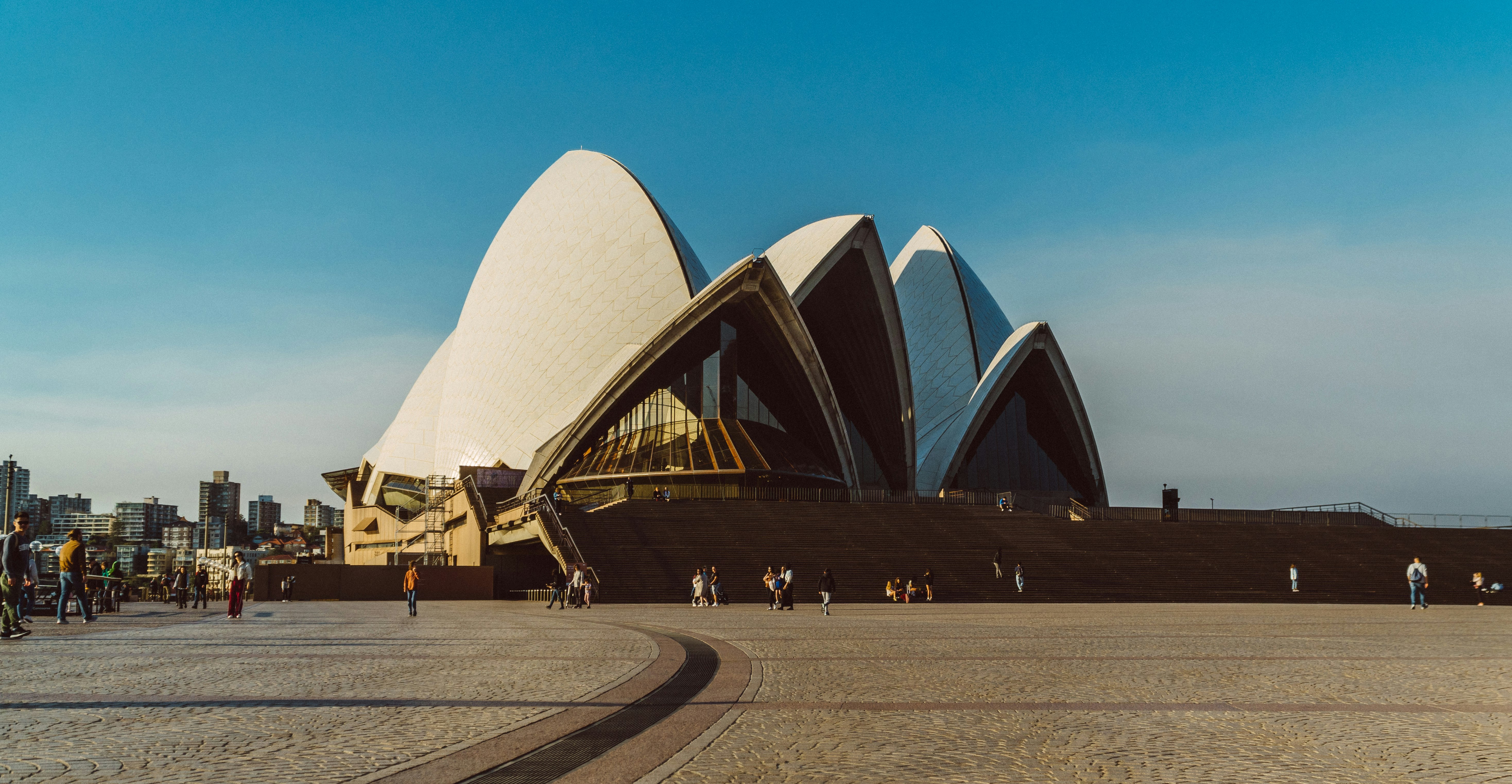 people walking near sydney opera house during daytime