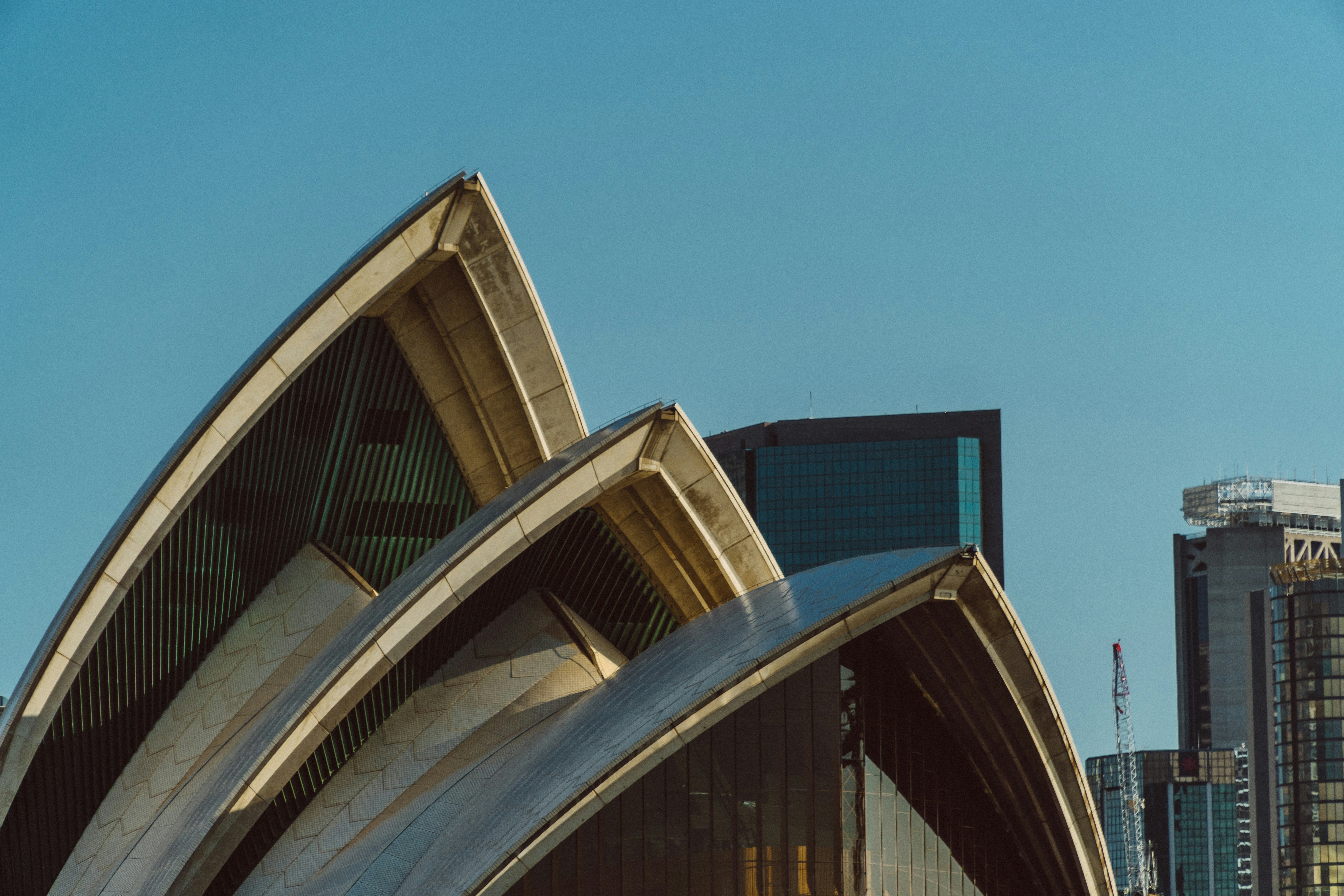white and blue concrete building under blue sky during daytime