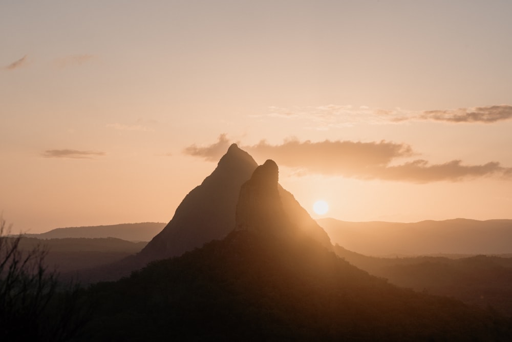 silhouette of mountain during sunset