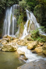 water falls on rocky river