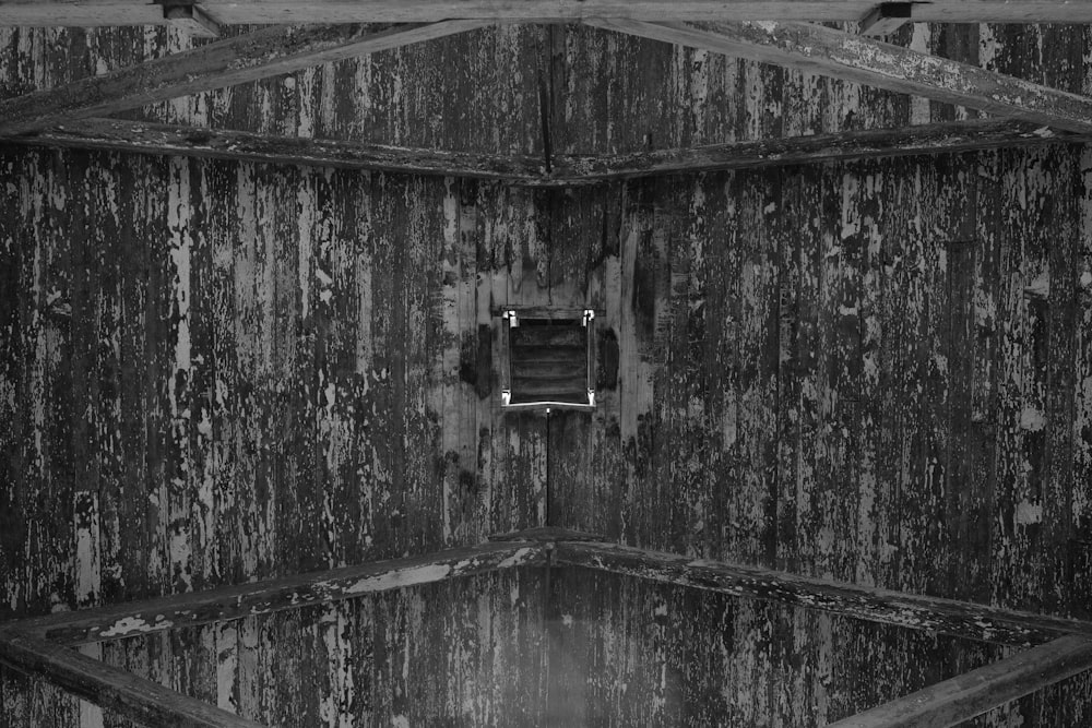 grayscale photo of wooden door