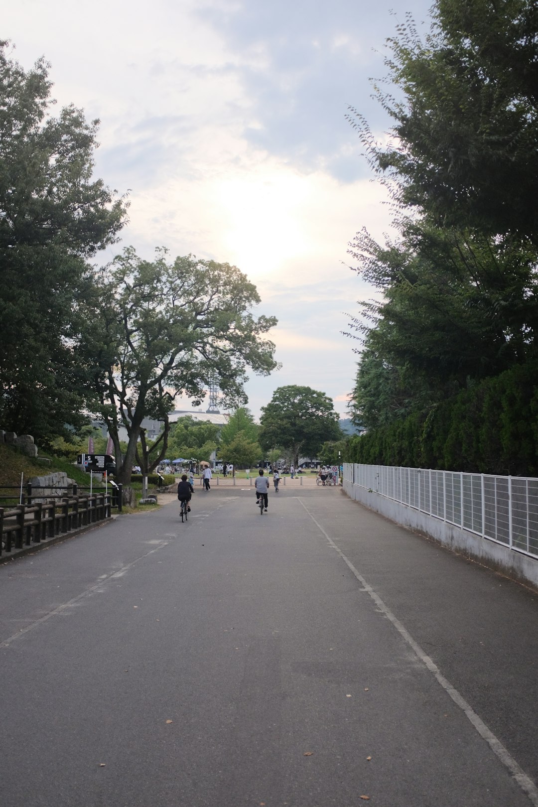 people walking on gray concrete road during daytime