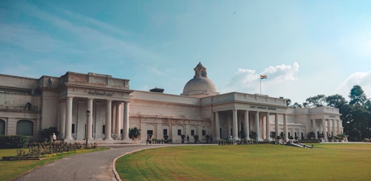 white concrete building under blue sky during daytime in Roorkee India