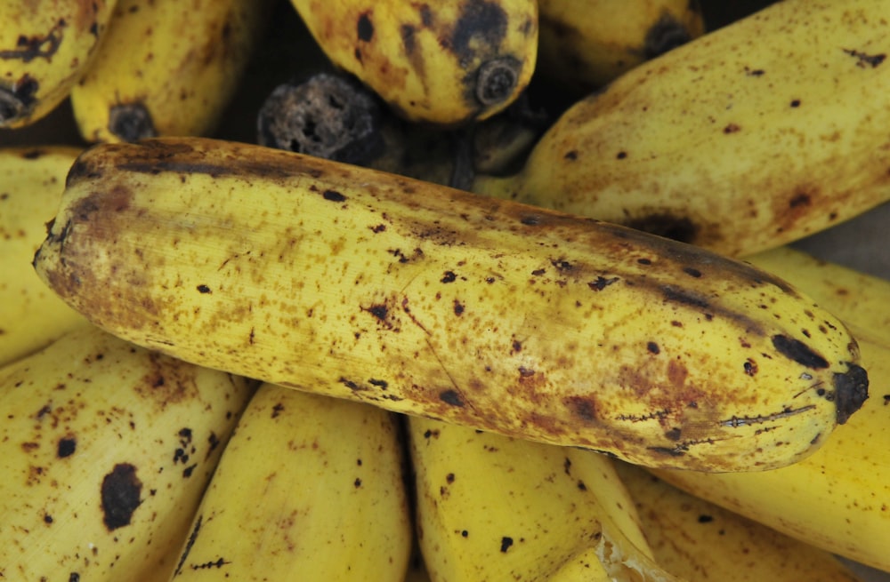 yellow banana fruit on white table