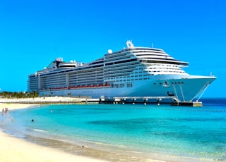 white cruise ship on sea during daytime