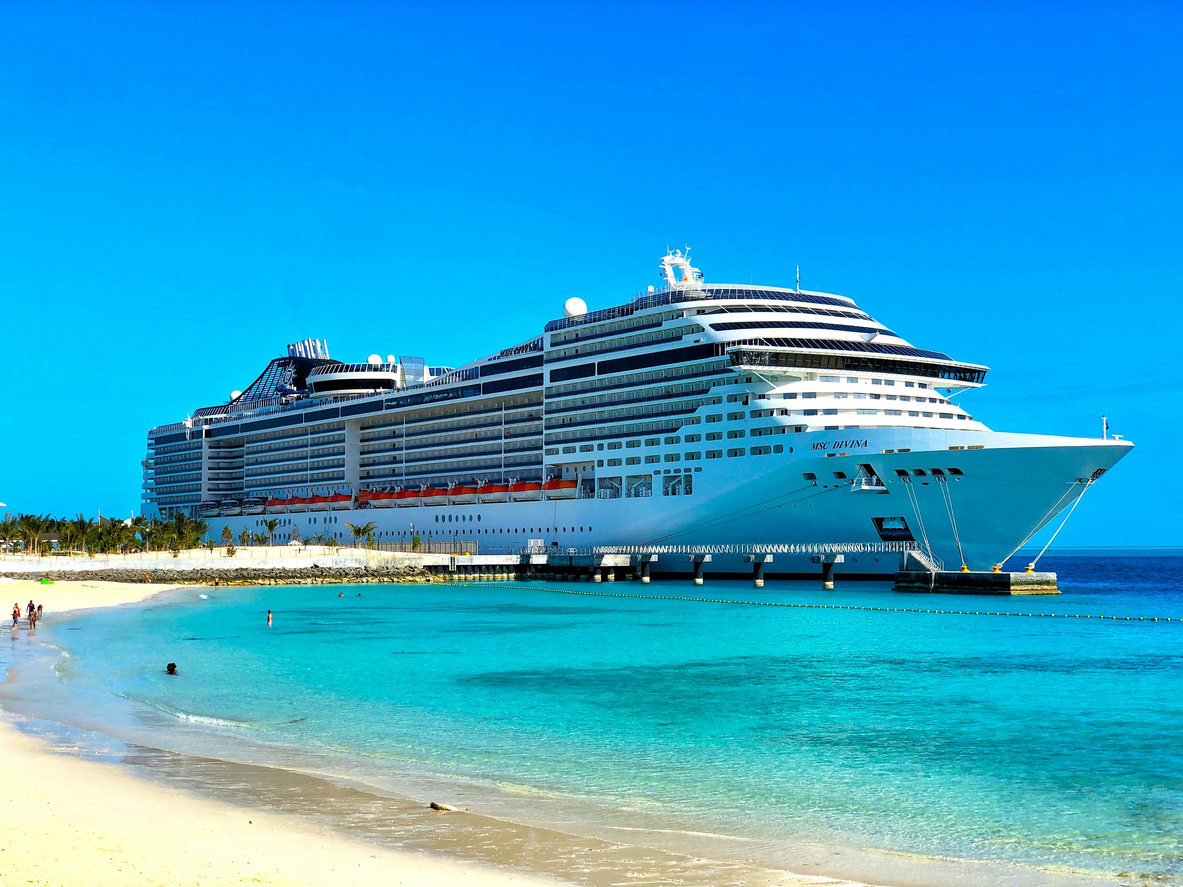 white cruise ship on sea during daytime