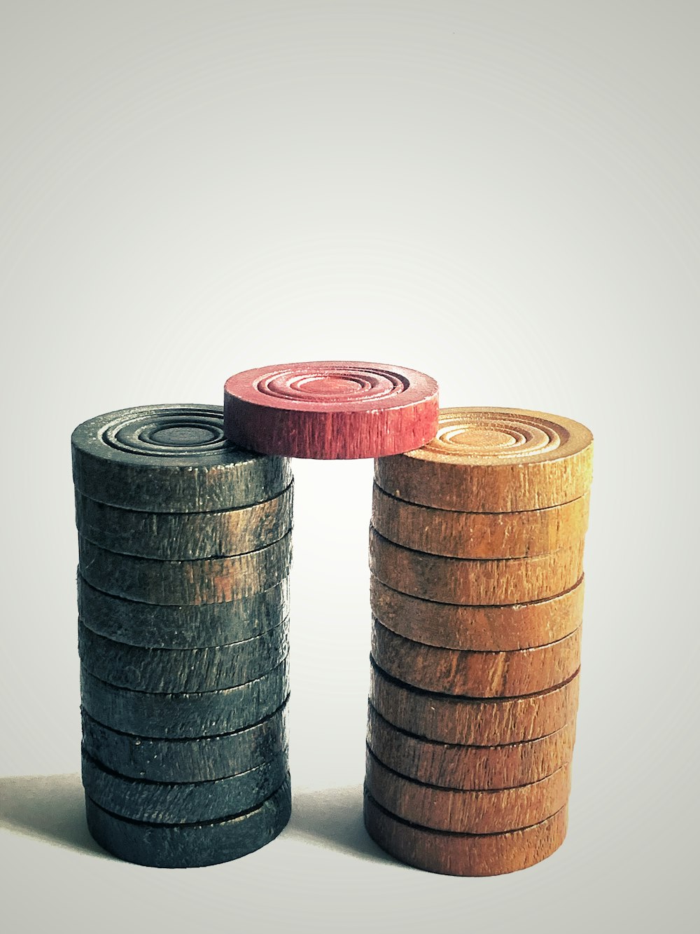 brown wooden barrels on white surface