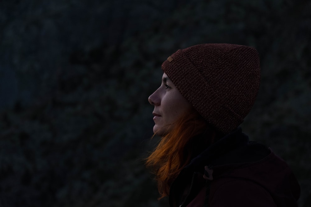 woman in brown knit cap