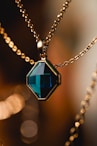 silver and blue gemstone pendant necklace