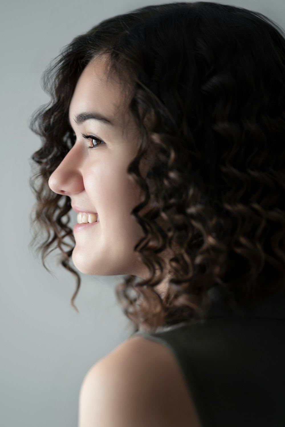 woman with black curly hair