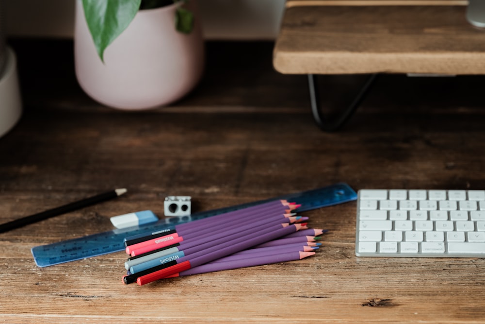 coloring pencils on brown wooden table