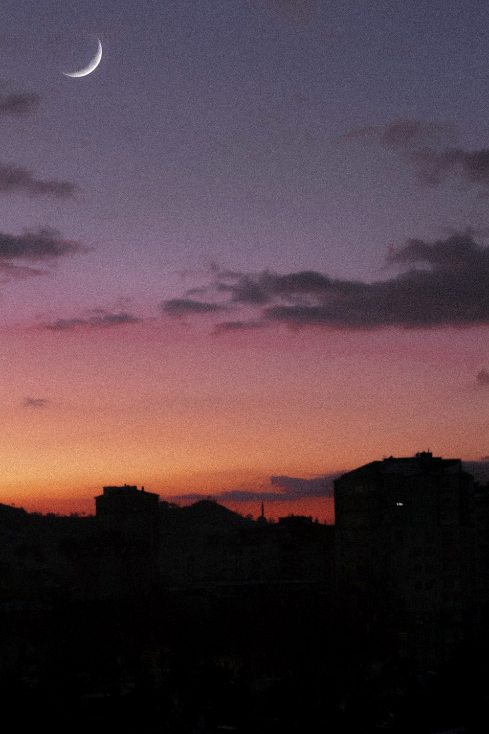 silhouette of building during sunset