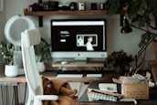 black flat screen tv on brown wooden tv rack
