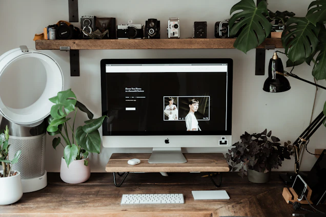 A clean, modern workspace with a camera, cleaning supplies, and tools neatly arranged, reflecting the property services offered.