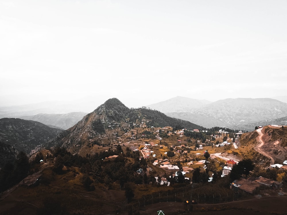 aerial view of city near mountain during daytime