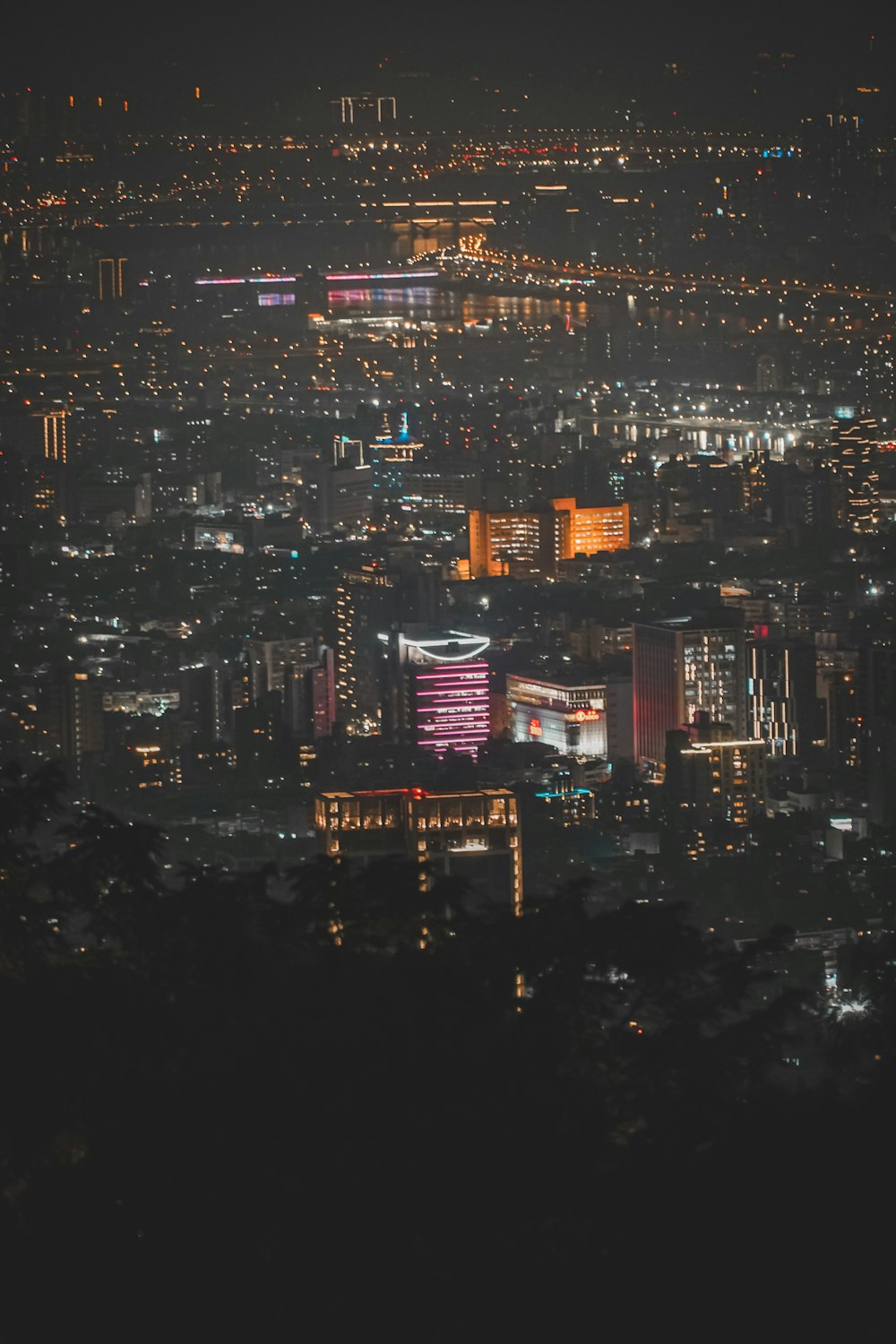 city skyline during night time