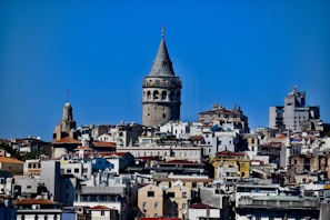white and brown concrete building under blue sky during daytime