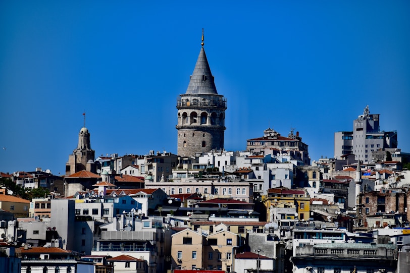 white and brown concrete building under blue sky during daytime