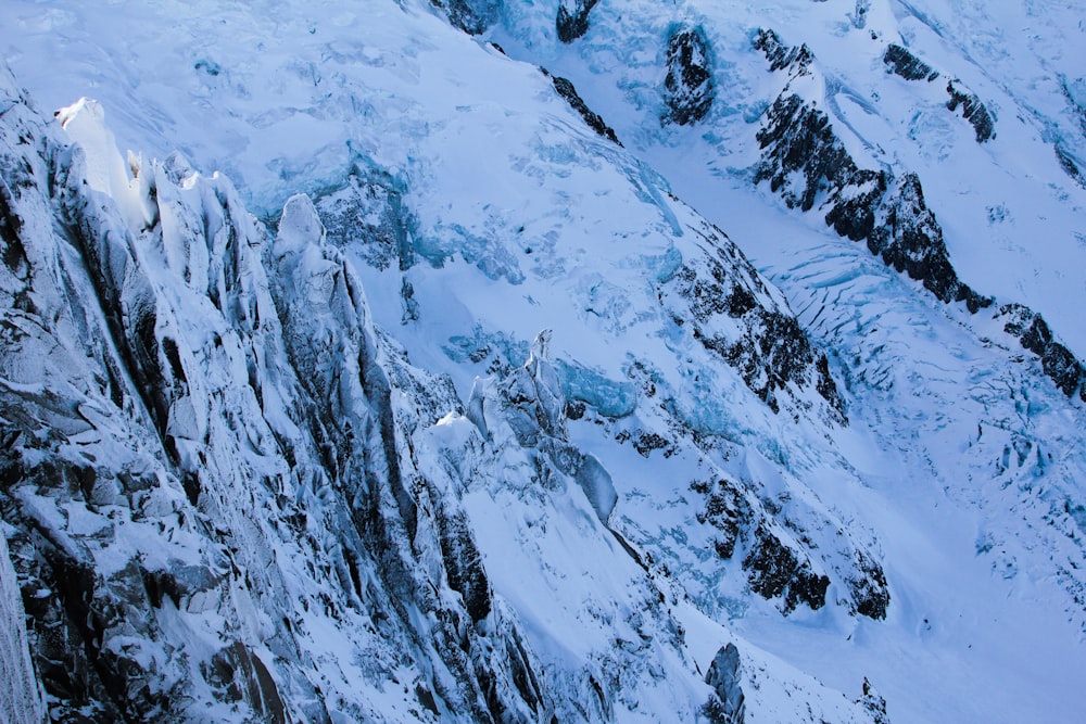 snow covered mountain during daytime