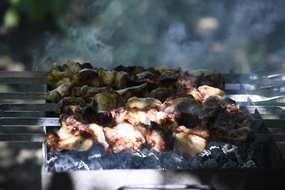 grilled meat on gray tray