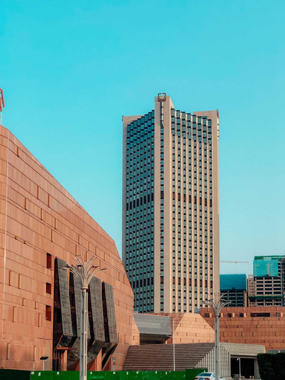 brown concrete building under blue sky during daytime