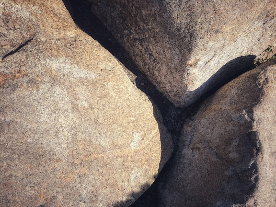 brown and gray stone fragment