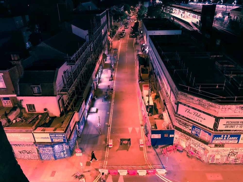 people walking on street during night time