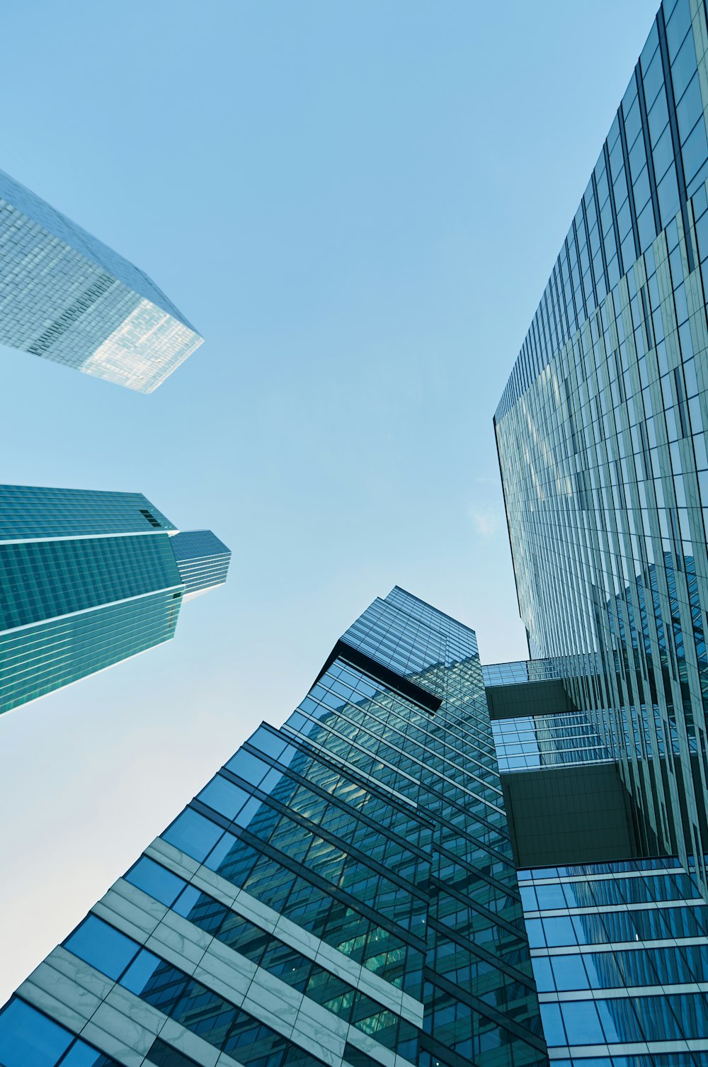 low angle photography of high rise buildings